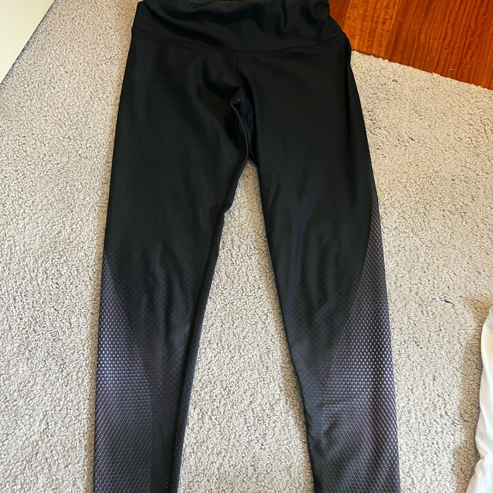 NUX leggings from bandier snake pattern multicolor